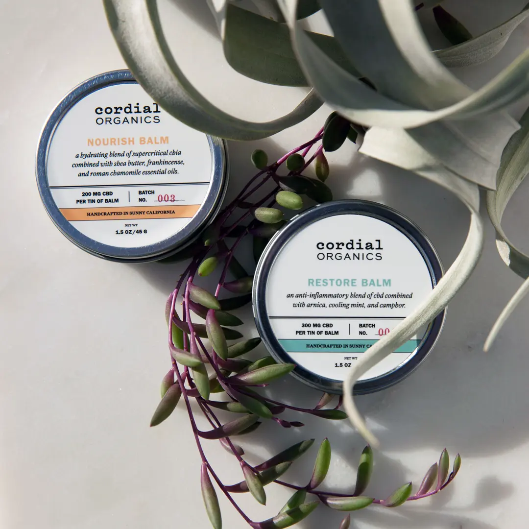 cordial organics nourish and restore tins for a buzzfeed article on cbd